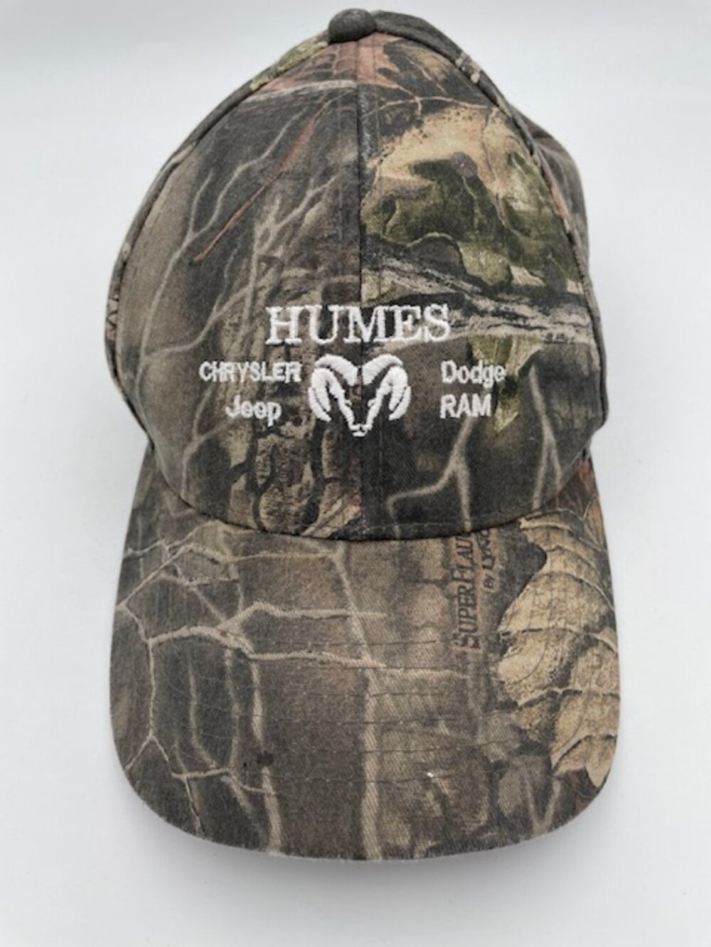 Camo Cap Embroidered with "Humes: Chrysler, Jeep, Ram, Dodge" with the Ram Logo
